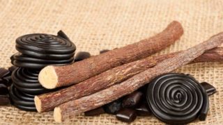 Dried licorice and licorice stems on a mat