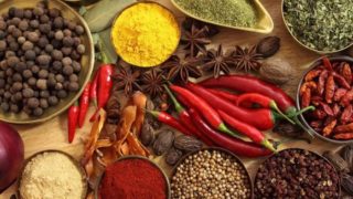 Colourful and aromatic spices spread on a table