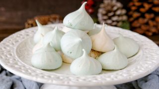 Aquafaba meringues on a cake stand