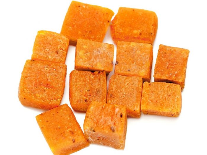 Asafoetida blocks on a white background