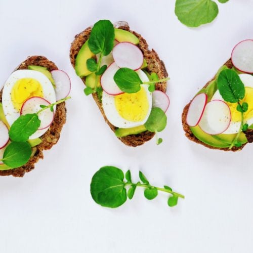 Three slices of avocado and egg toast