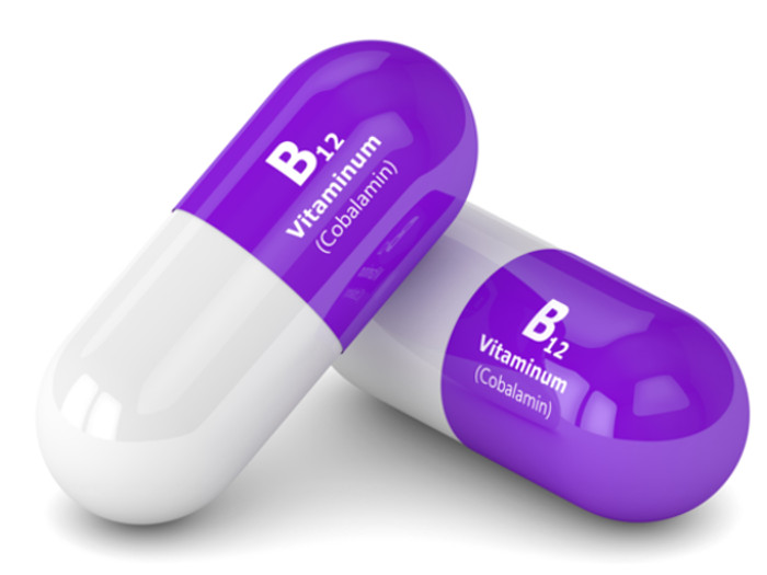 Close-up image of two vitamin B12 supplements