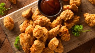 Homemade crispy popcorn chicken with barbecue sauce