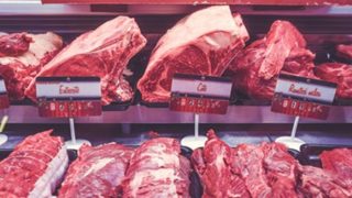 Freshly cut packaged beef in a supermarket meat display