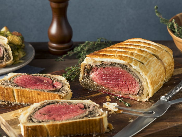 Homemade Christmas Beef Wellington with a pastry crust