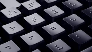 Black keyboard with braille characters