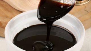 Close-up image of molasses in a bowl