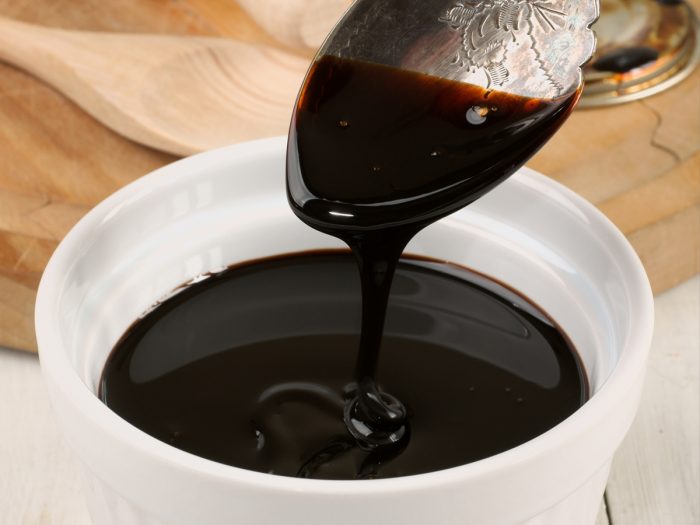 Close-up image of molasses in a bowl