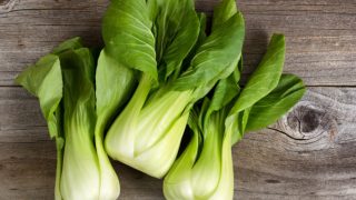 Fresh bokchoy on a wooden table