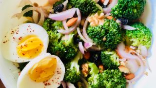 Broccoli Salad served with boiled eggs on the side