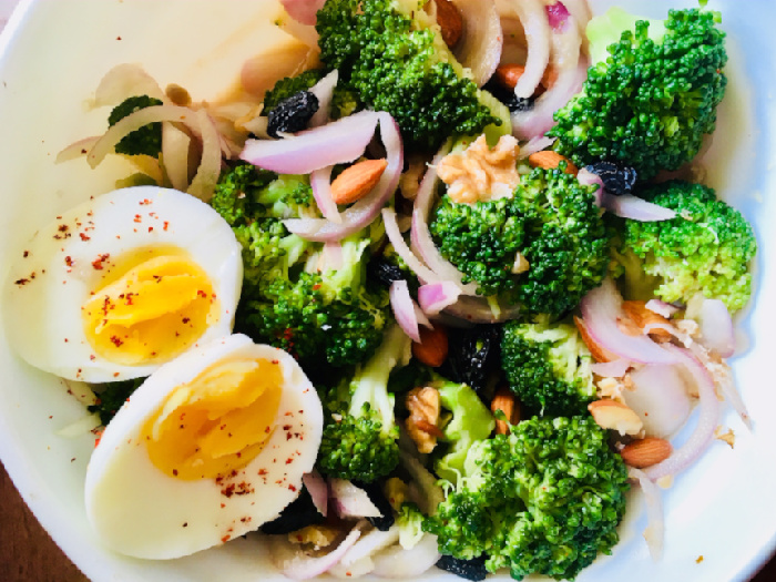 Broccoli Salad served with boiled eggs on the side