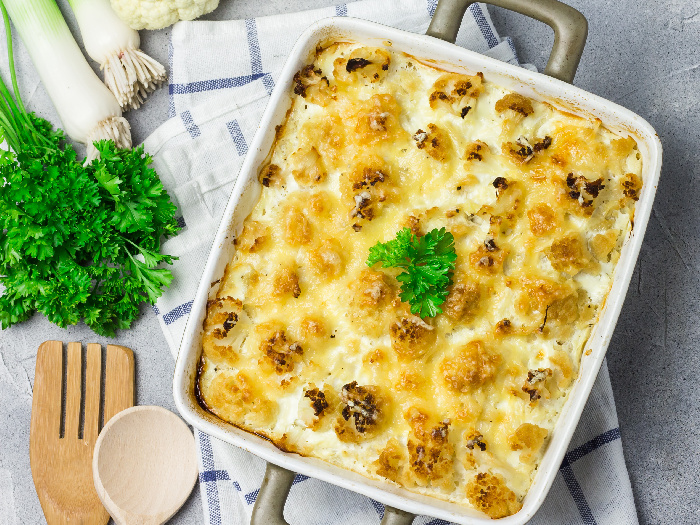 Cauliflower casserole on concrete background