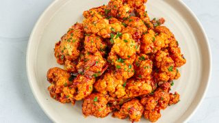 Buffalo Cauliflower Wings on a Baking Sheet