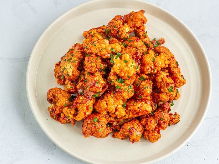 Buffalo Cauliflower Wings on a Baking Sheet