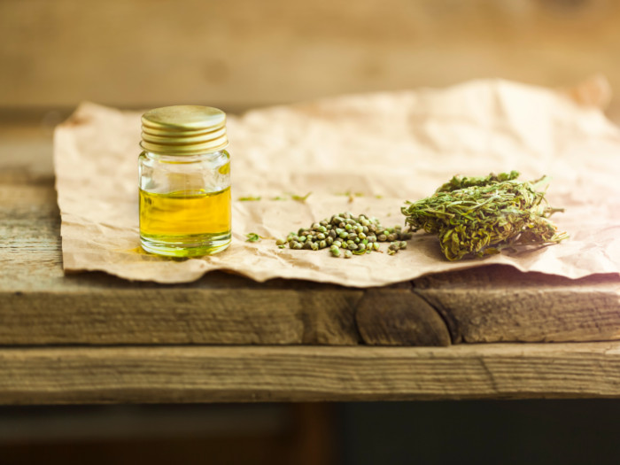 Medicinal cannabis with oil extract in a bottle