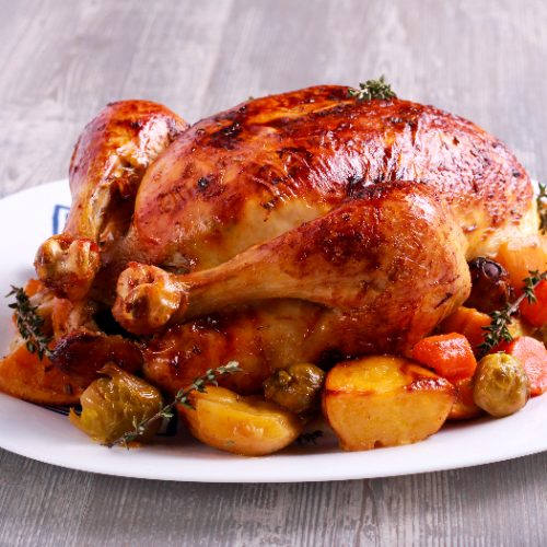 Roast chicken with brussel sprouts, carrot and potato