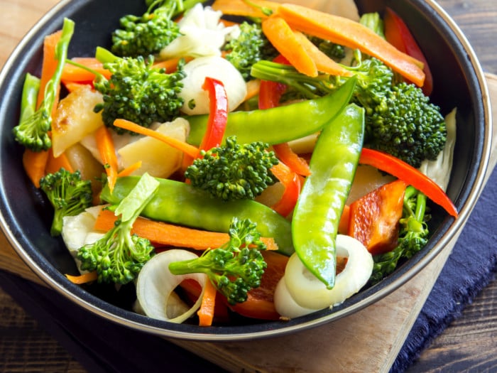 Broccoli, onions, carrots, and snow peas stir fry