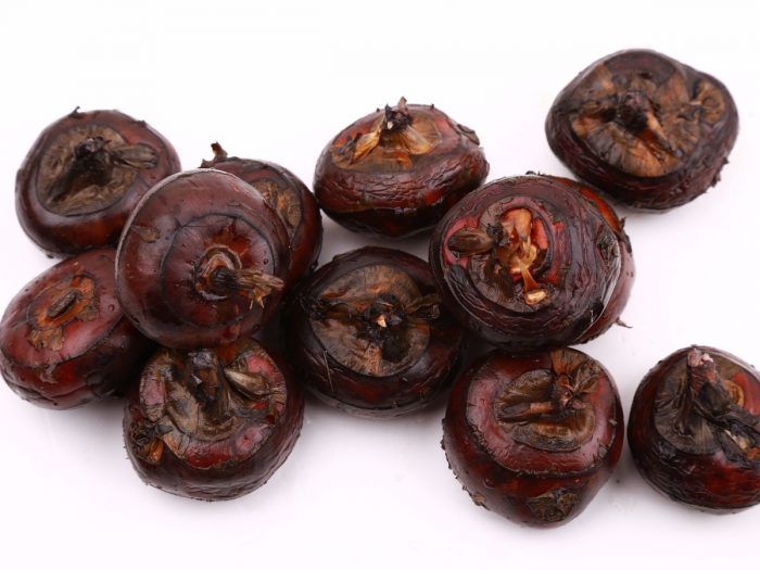 Water chestnuts on a white background