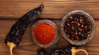 Whole chipotle peppers, ground powder, and crushed chili flakes