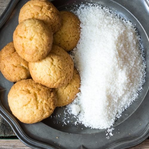 Coconut cookies and coconut flour on a pretty serving dish