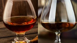 A glass of cognac and a glass of brandy kept next to each other as a way of showing their differentiation.