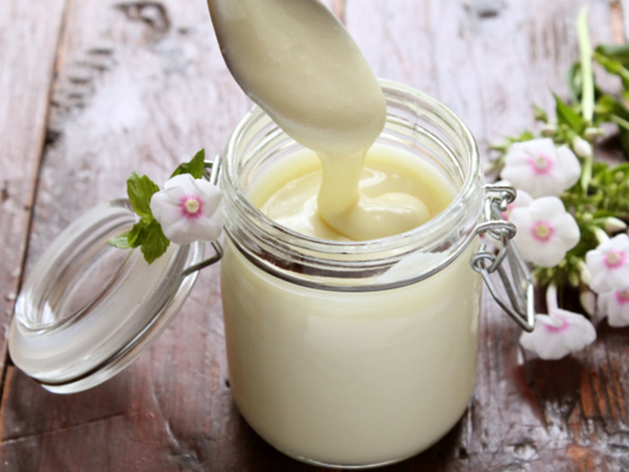 Jar of thick white creamy liquid