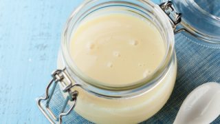 A close-up shot of a container of condensed milk