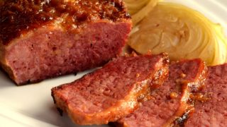 Corned beef and cabbage on a white dish