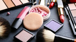 Make-up products including lipsticks, eye-shadows, blush-on, bronzer, and a make-up brush