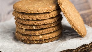 A stack on digestive biscuits on a counter