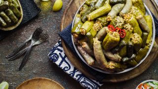 Arabic Cuisine; Middle Eastern traditional dish "Mahshy"or"Dolma". Stuffed Zucchini, eggplant,tomato,peppers and vine leaves