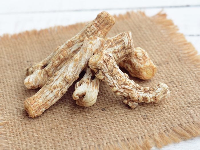 Dong quai or Angelica sinensis placed on a sackcloth