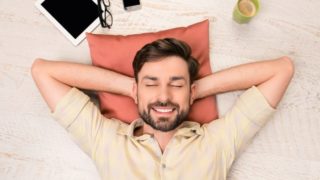 Man dreaming while lying down