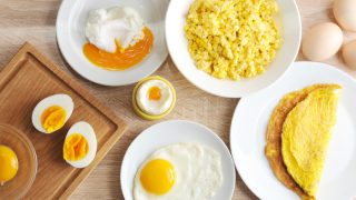 Egg preparations placed on a wooden surface