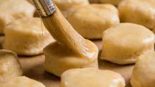 Brushing scones before baking