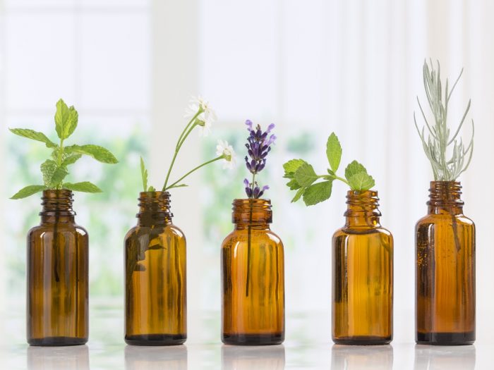 5 bottles containing different type of herbs