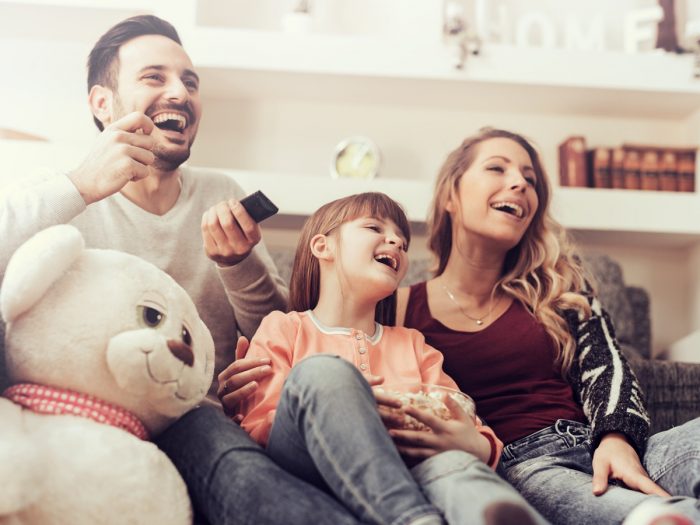 A family watching a TV show together