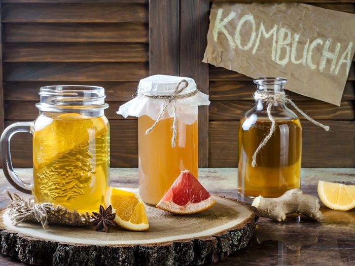 Different varieties of kombucha made with oranges, grapefruit, ginger, and lime