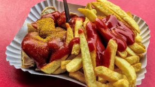 French fries with ketchup on top