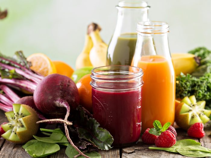 A close-up shot of different kinds of fruit juices