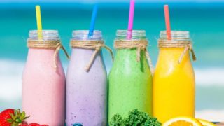 A picture of different kinds of fruit smoothies