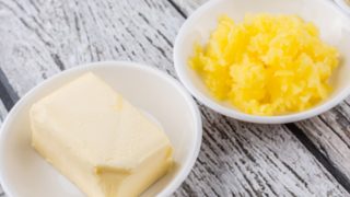 Two bowls filled with butter and ghee