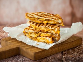 grilledcheesesandwichthree Grilled cheese sandwich kept atop a wooden platform