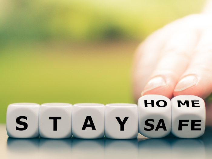 Dices lined up to spell 'stay home stay safe