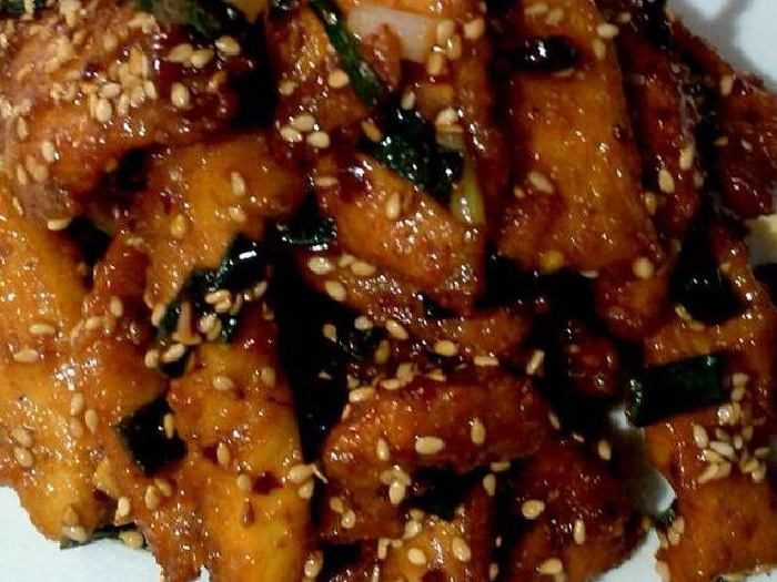 A close up shot of honey chili chicken