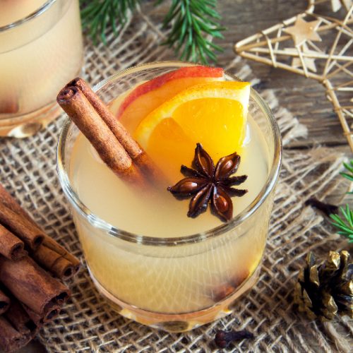 Hot toddy drink (apple orange rum punch) for Christmas and winter holidays