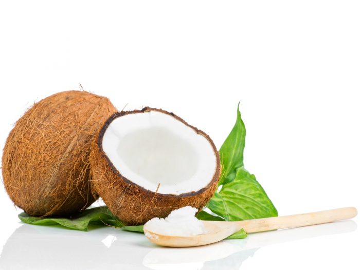 Coconut shells with a spoon of coconut