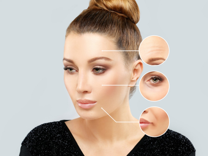 A close-up shot of a woman's face with part of her skin highlighted