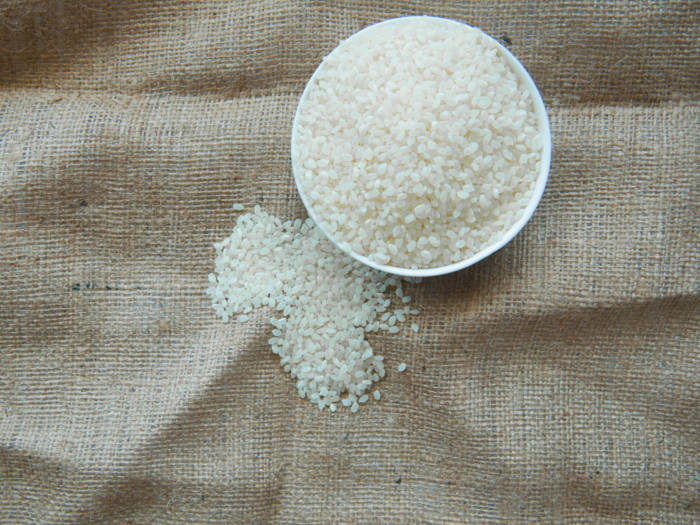 Sushi rice in a bowl kept on a jute cloth