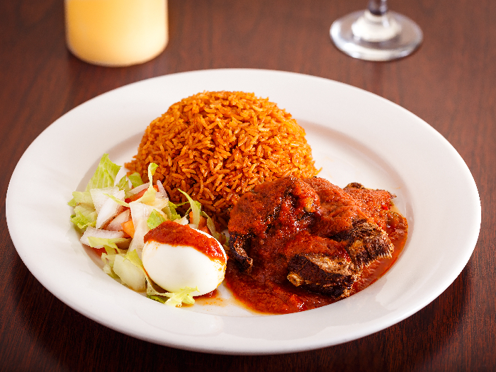 Jollof rice dome in a white plate